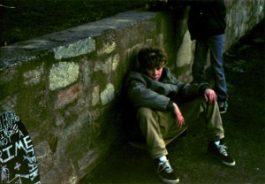 Eddie looking stylish in Vans, baggy khakis and an oversized bomber.